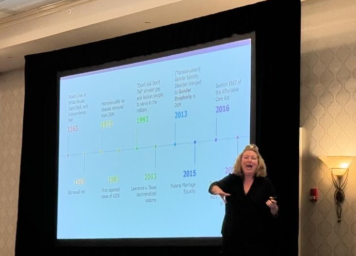 Just me and my favorite slide during my talk: 'Pride, Prejudice and Medical Progress: The Journey to LGBTQ+ Health Equity' in honor of #lesbianvisibilityweek.