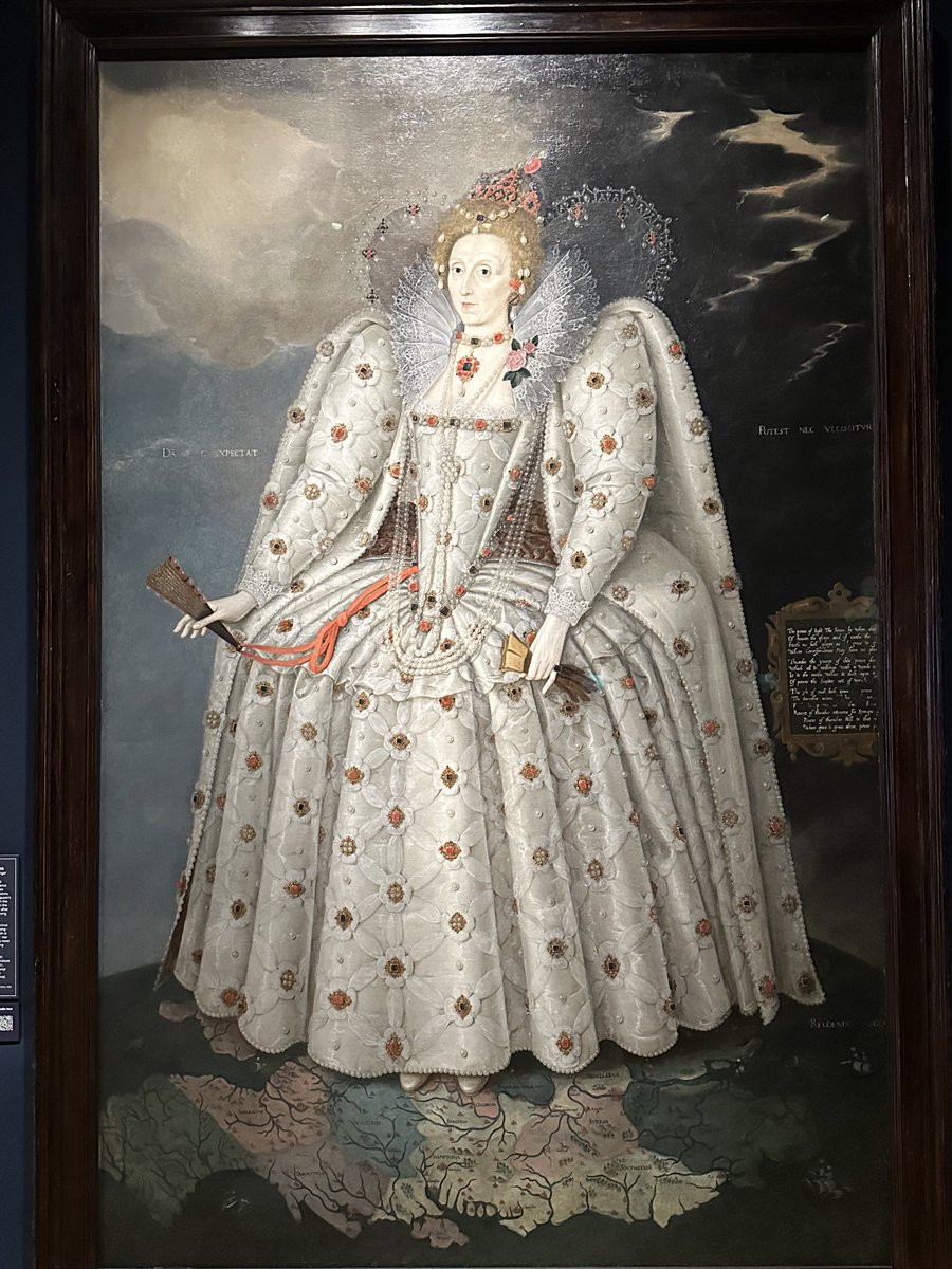 The famous Ditchley Portrait of Elizabeth I, on display at ⁦@NPGLondon⁩ Dating to 1592, it depicts Elizabeth standing on a map of the world, with her feet specifically on Oxfordshire. Behind her are stormy skies, but in front there is sunshine #elizabethi #tudor #elizabeth