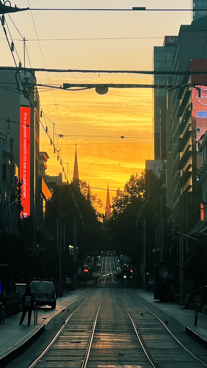 Morning all xx gorgeous sunrise looking up Bourke St towards Parliament House in Naarm on Wurundjeri Country 🖤💛❤️ please remember to be kind to yourself today - you deserve it ♥️♥️ #AlwaysWasAlwaysWillBe