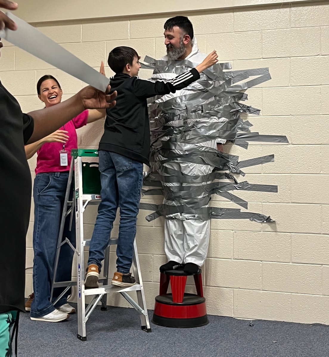 Another ROCKIN’ good day of MAP celebration <a href="/EastAiken/">East Aiken</a>! Today we celebrated with 3rd/4th/5th graders who met their MAP goal! They (the teachers too) got to tape <a href="/KDBlankenship/">Kyle D. Blankenship</a> &amp; me to the wall with duct tape!  I stayed up! It was so much fun! #LoveMyStudents