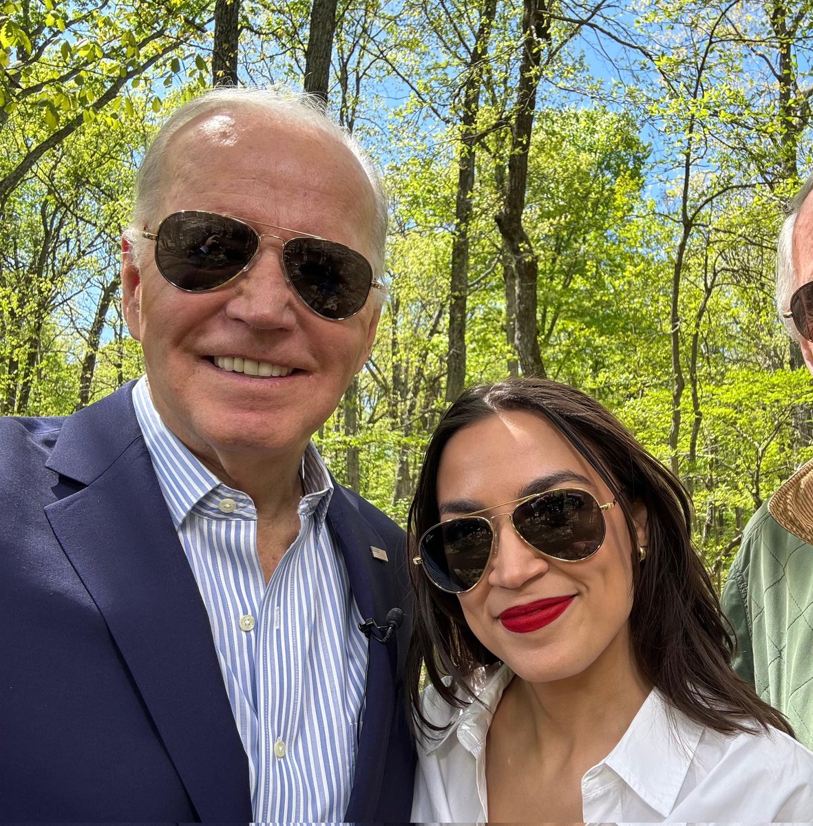 Genocide Grandpa and his diversity sellout wear matching aviator sunglasses to hide the snake eyes