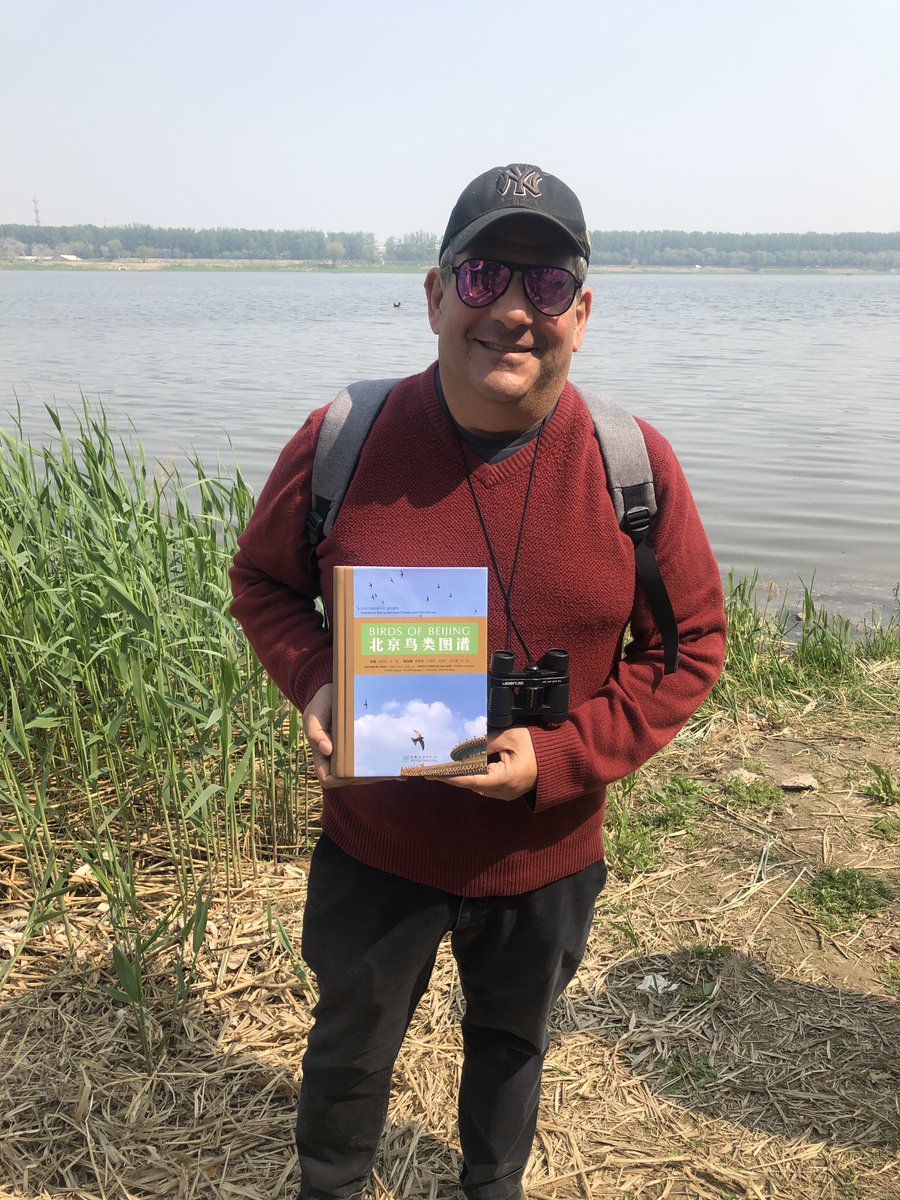 Congratulations to @TheEconomist 's Ted Pflaker on receiving a copy of the Birds of Beijing after @rasbjchina 's birding trip to Shahe Reservoir, having beaten off all competition to win the end of trip quiz!