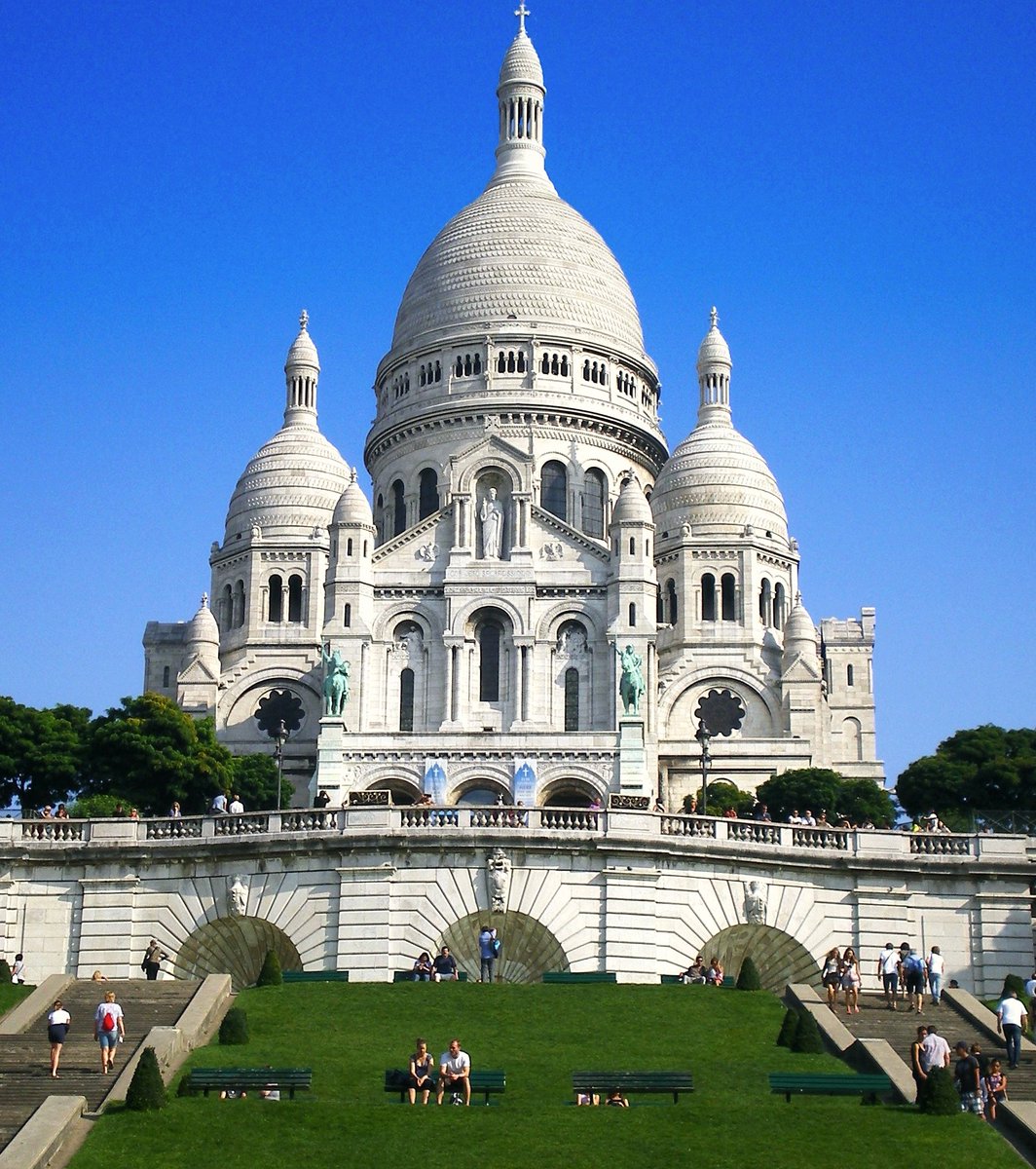 'The Basilica of Sacre-Coeur, perched on the hill of Montmartre in Paris, is a majestic example of Romanesque-Byzantine architecture. Construction of the basilica began in 1875 and took approximately 39 years to complete, with the consecration ceremony taking place in 1919.'