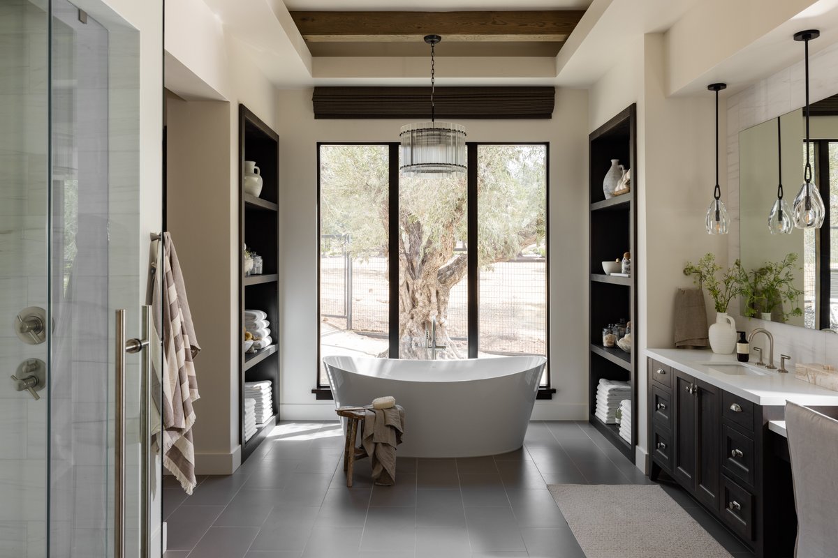 This serene 2023 NKBA NorCal Award Winning Bathroom from @rachelhillsdesignco featuring BainUltra's Evanescence Oval is the perfect way to unwind and indulge in luxurious relaxation. #bathroomgoals