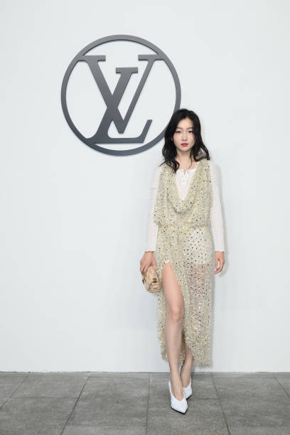 Hoyeon Jung and Zhou Dongyu at the Louis Vuitton Pre-Fall 2024 show in Shanghai, China