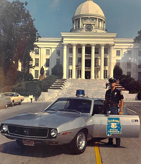 Really interesting photograph of an Alabama State Trooper and his AMC Javelin Police Special. Jeff Davis statue in the background and a rebel flag front plate. It is cropped out of the photograph but the capitol also flew a Confederate flag over the dome at this time, I think.