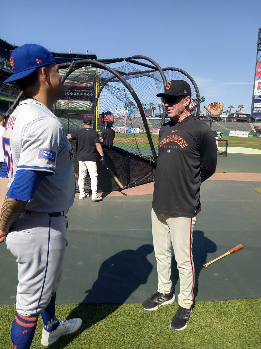 Giants manager Bob Melvin and former pitcher Sean Manaea chopping it up pregame