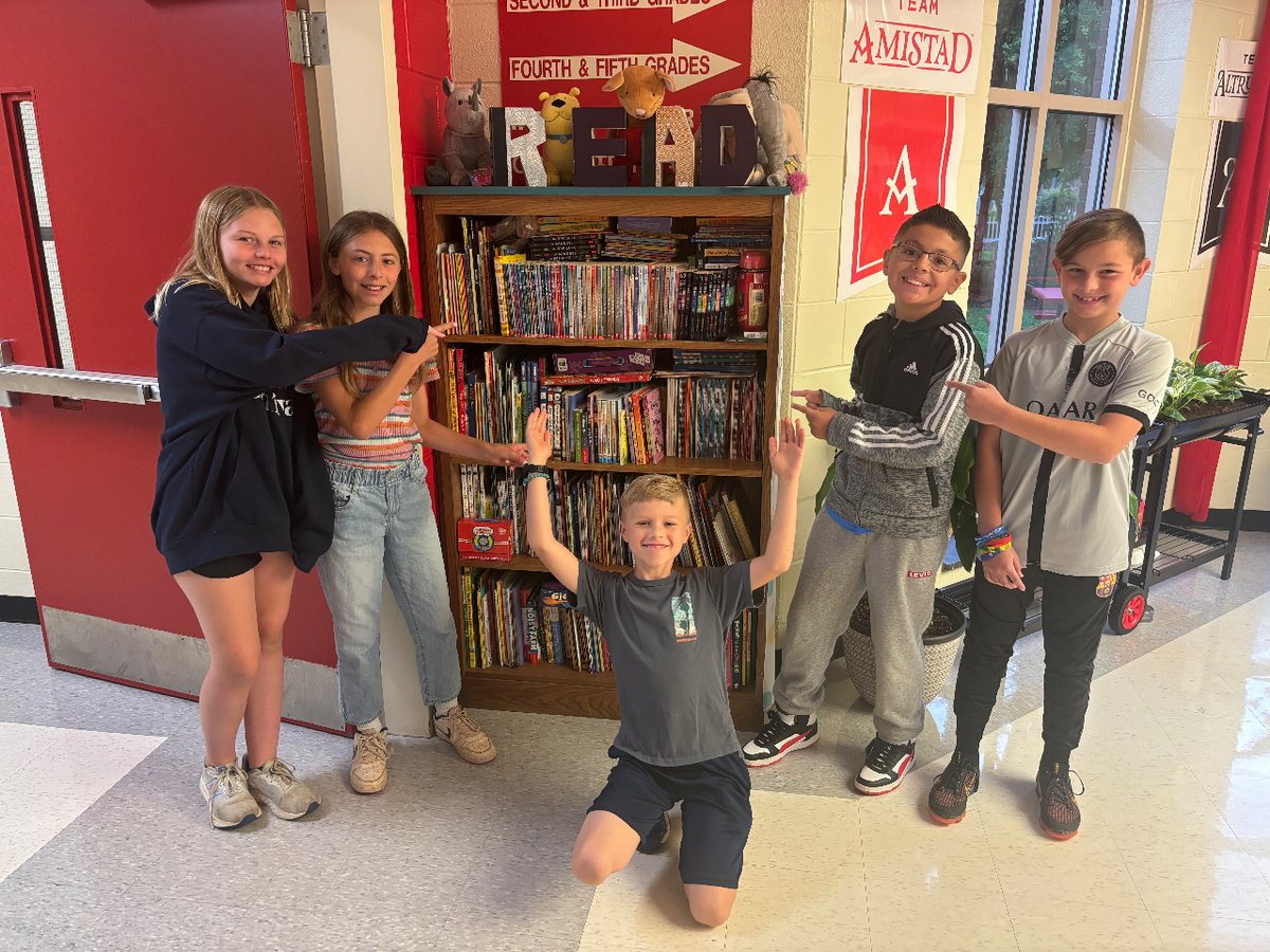 The bookshelf is filled with books as you supported the House service learning project. Students start packing them up for delivery to Union County DSS. Thanks for all of your help in collecting these books!