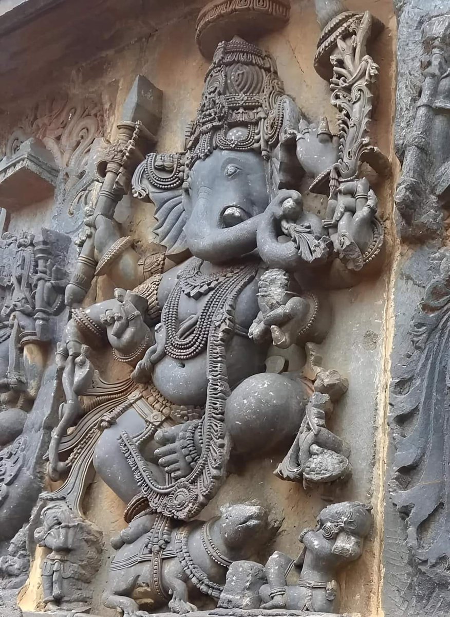 Beautiful stone carving dancing Ganesha..... Seen in 12th century temple at Halebeedu,
 Karnataka.India.