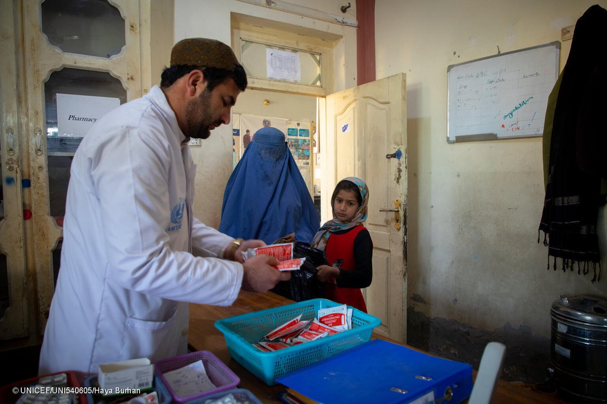 A life-saving paste. Hasenat, 2, is eating Ready-to-Use-Therapeutic Food (RUTF), after being screened for malnutrition in Afghanistan. In 2023, UNICEF delivered over 1 billion sachets of RUTF – a lifeline to help children recover.