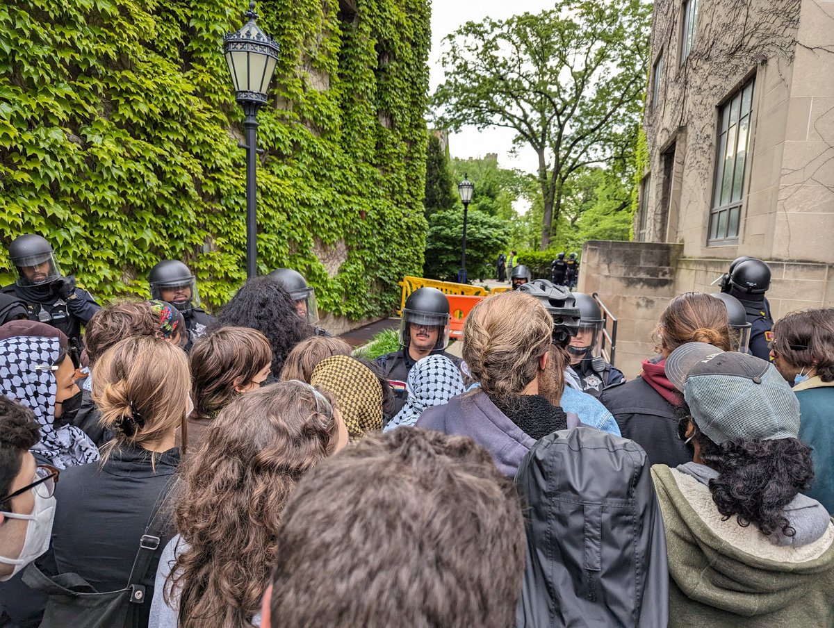 Three hours after University of Chicago Police started clearing the encampment students and police continue to face off. @WBBMNewsradio