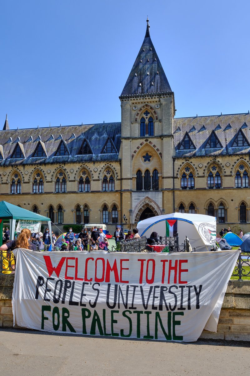 beneath swifts and parakeets, in front of @morethanadodo - an outdoor classroom was hearing from a medic about the impact of sniper rounds on children ... #palestine #Oxford #GazaSolidarityEncampment