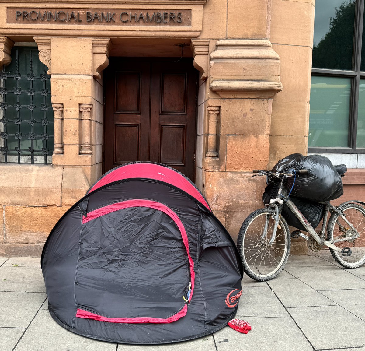 From 'Haunt' (Salmon 2015). Came to mind while walking past (now dismantled) static caravan of migrants' tents on pavement on Mount Street: very different protest by people with no homes to return to. Pic taken yesterday near College Green: somebody homeless, migrant or native.