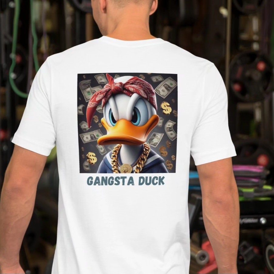 onemorecanada.etsy.com/listing/170222…
T-shirt Pop-Art Gangsta Duck: Donald Duck en mode Hip-Hop!
#PopArt #GangstaDuck #HipHopFashion
#Streetwear #DonaldDuck #UrbanStyle
#TshirtDesign #GangstaStyle #UrbanArt
#DollarPrint