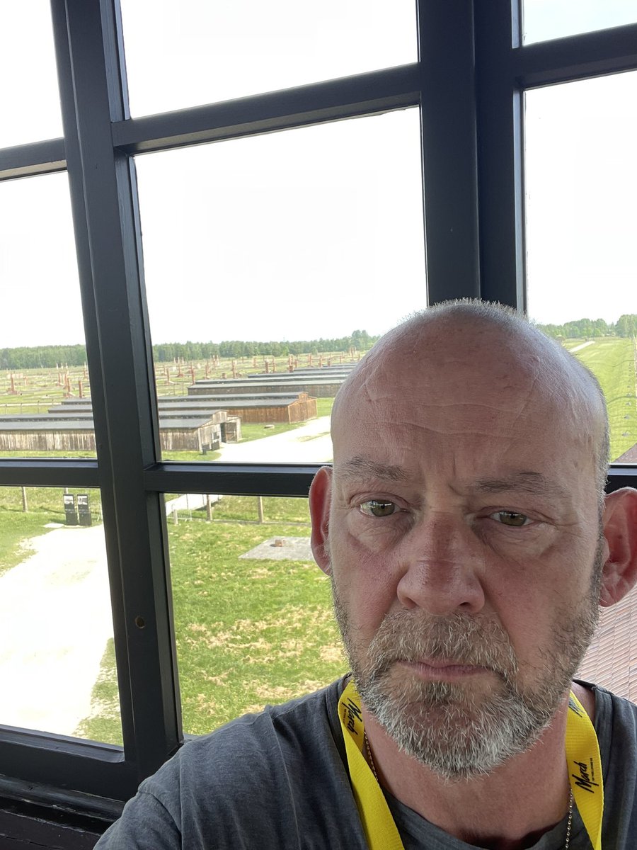 Well known Zionist priest takes selfie in Auschwitz watchtower.