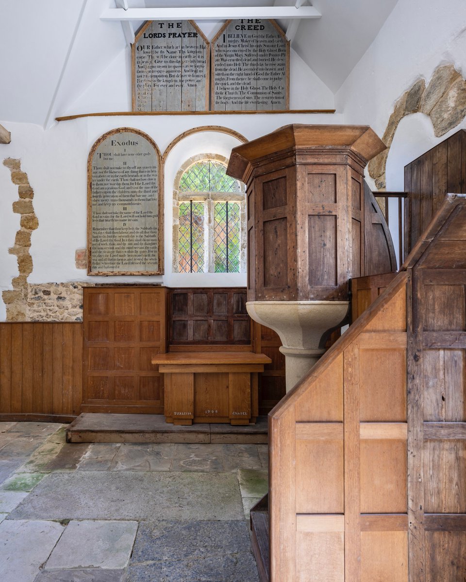 Until 1868, all Anglican churches were legally required to display the Lord’s Prayer, the Creed, and the Ten Commandments on their east walls. In Tuxlith Chapel, West Sussex, these once mandatory fittings survive, along with an enormous 18th-century wine-glass stem pulpit.