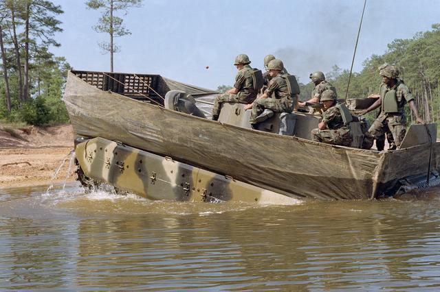 Super Tank Sunday - A tank that floats?  Oh wait, that is a M2/3 Bradley swimming in the early 1980s. With the swim barrier hard to tell if a Crunchie (M2) or Cav (M3) version!  lol.... #armor #supertanksunday #bradley #1980s #ilovetanks #tanklover