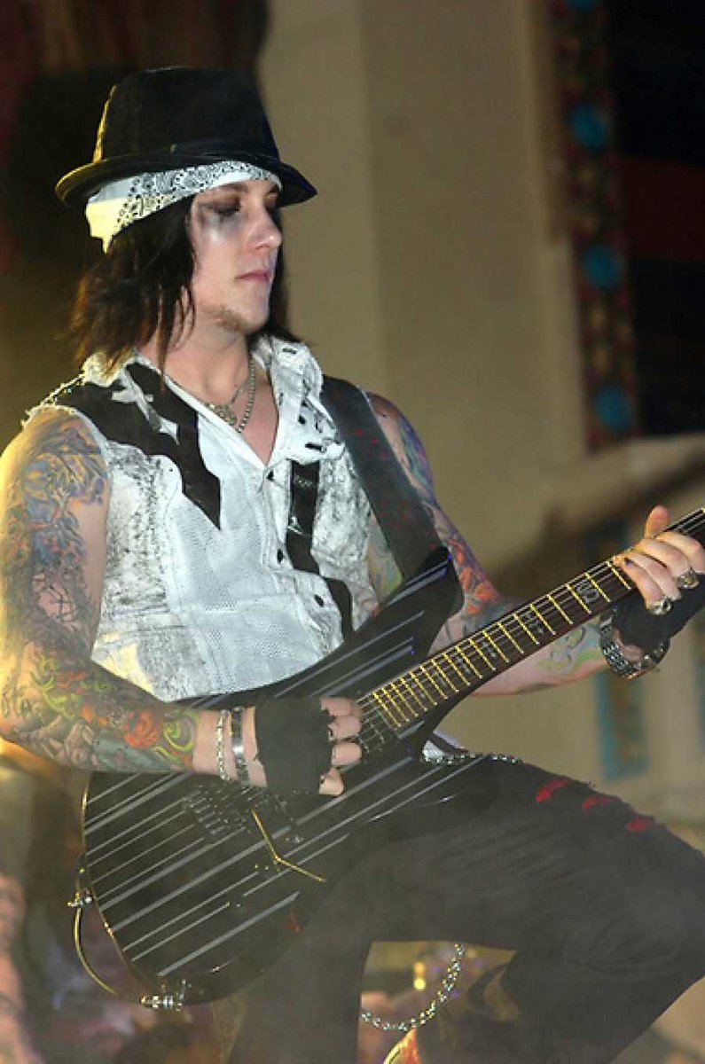 Synyster Gates performing live onstage at the Aragon Ballroom in Chicago, Illinois on the Cities of Evil Tour - 11th May 2006 📷: Gene Ambo