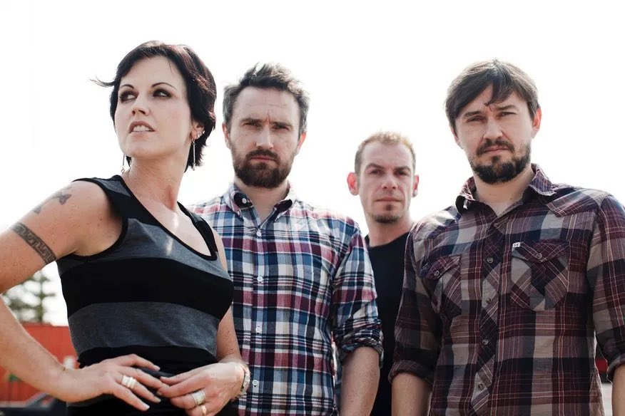 In 1989, Irish rock band The Cranberry Saw Us formed in Limerick. The name was a pun on “the cranberry sauce.” A year later, lead singer Niall Quinn departed to focus on his own group. Quinn introduced the remaining group to a female signer-songwriter… #rock #thecranberries