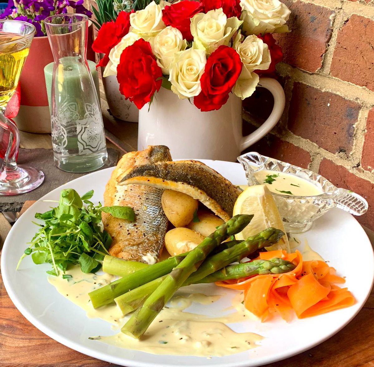 Good evening to you all❤️ Tonight’s tea🥘: Sea bass with a white wine, lemon & butter cream sauce. Jersey royals, ribboned carrots, asparagus & a watercress, pea shoots & sorell salad. A very large vodka or 5 with good music & all your great company 🎶 I’m a lucky girl❤️🍸