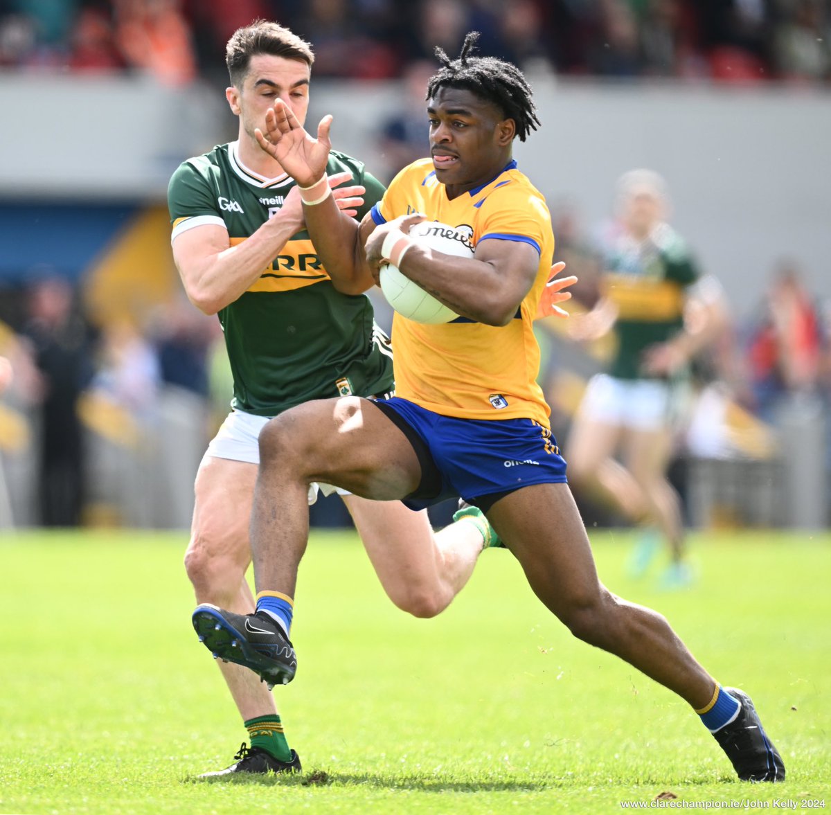 Ikem Ugweru of Clare in action against Brian O Beaglaoich of Kerry during their Munster Senior Football final at Cusack Park. Photograph by John Kelly. The final score is @GaaClare 1-13 , @Kerry_Official 0-23 @MunsterGAA #GAA