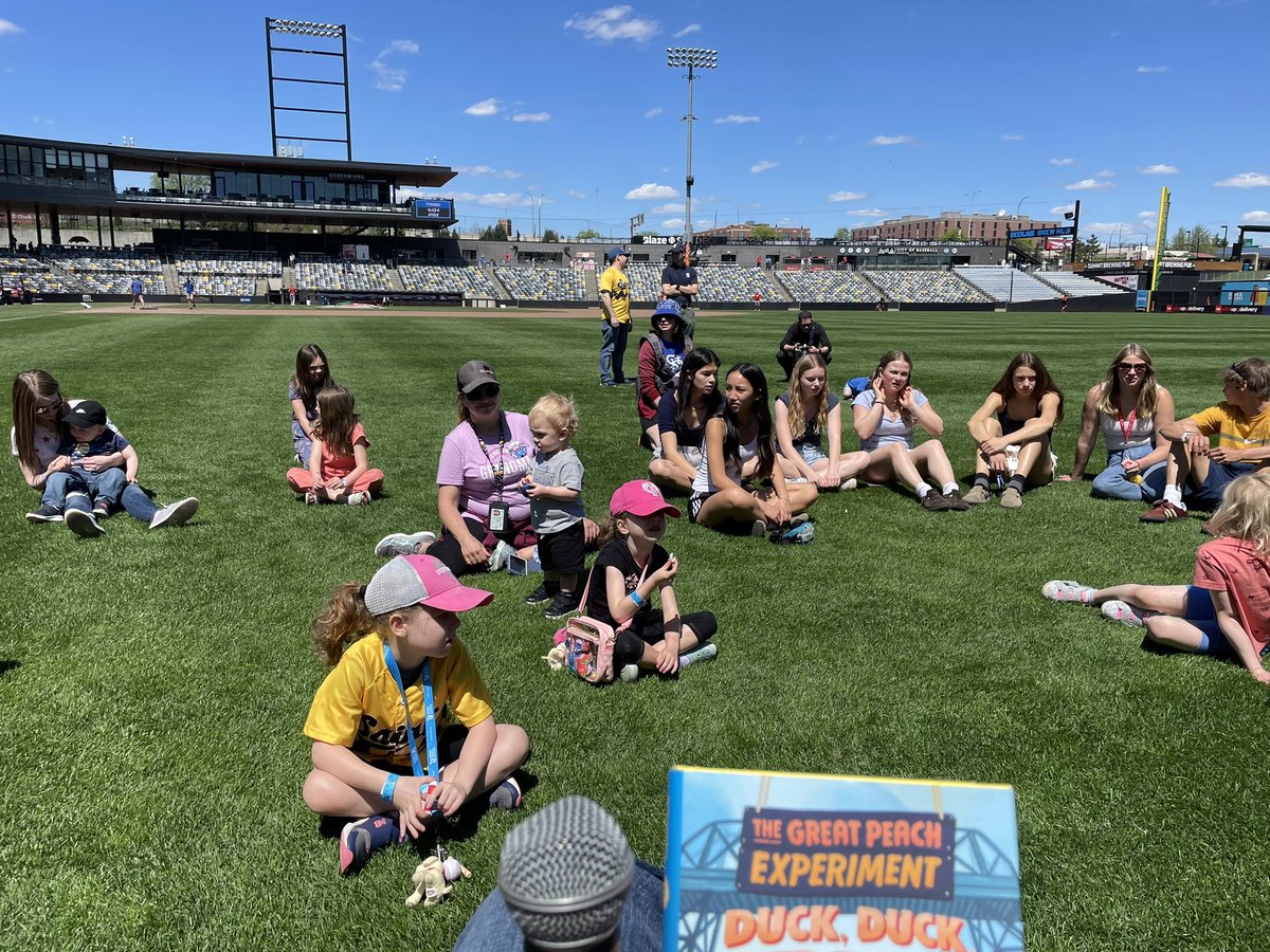 A beautiful day to read and do a fun duck-toss game on the field at the St. Paul Saints game! Thank you, @MackinLibrary!! I got to meet and feed the team pig!