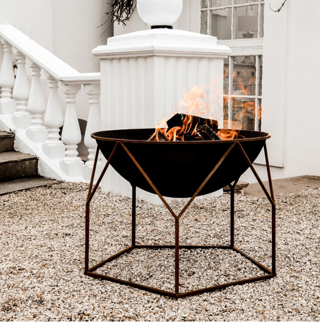 Don't let the summer breeze chill your outdoor gatherings. 🔥 Grab your firepit today at charltonisland.com and keep the party going! #OutdoorEntertaining
