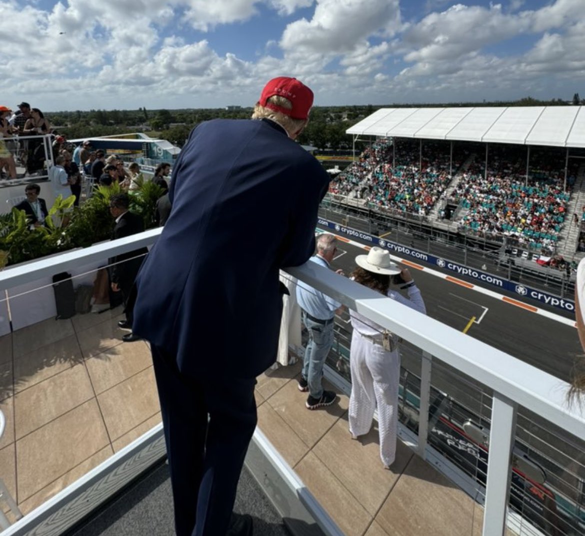 Man of the People watching the race with his beloved wife and friends.