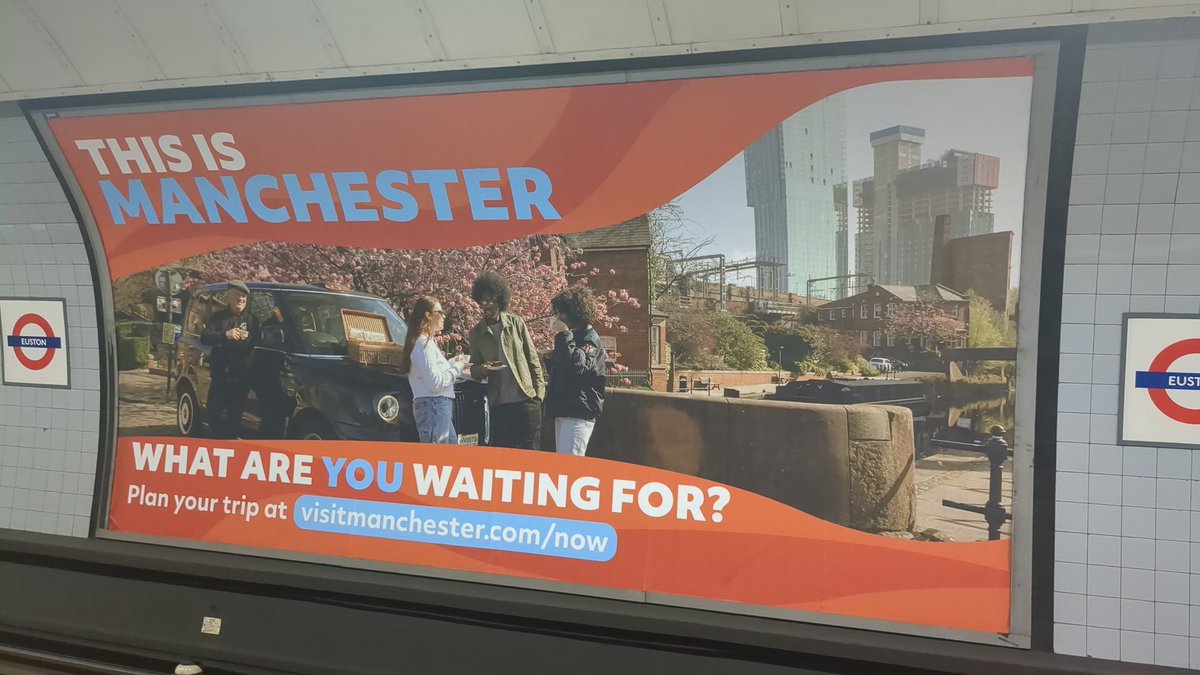 Possibly one of the weirdest adverts - partially constructed tower plus people having a standing picnic with a cabbie lurking nearby? #VisitManchester