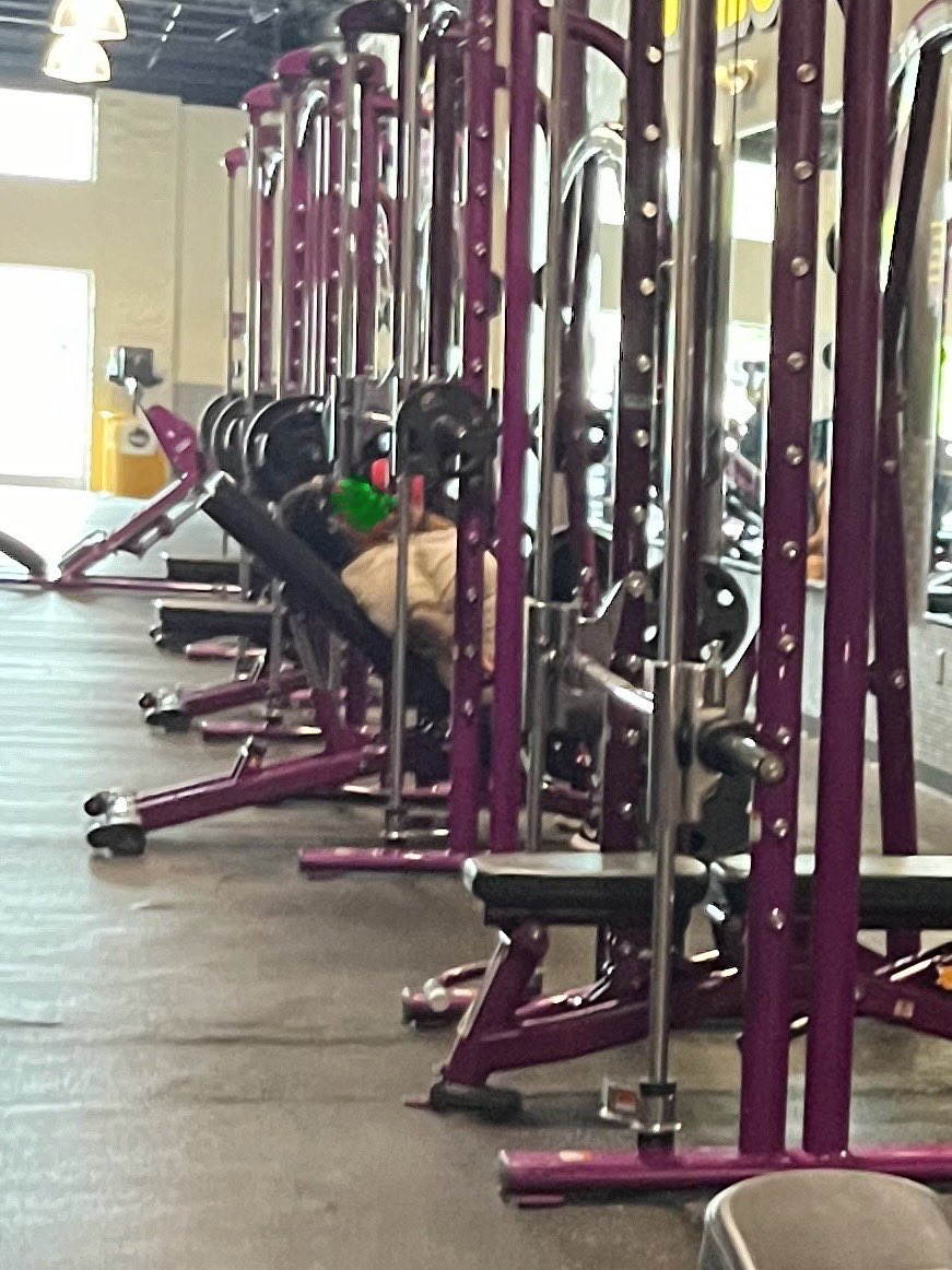 3 out of 4 smith machines are in use. The 4th is broken. People are waiting and this woman is lounging while making a phone call. 

(She didn’t clean the machine or re-rack her weights.) 

#JudgementFreeZone