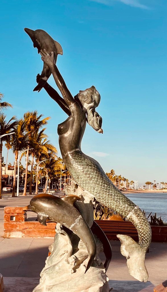 One of the sculptures, mermaid and dolphins, at the #malecon in @La_Paz_BCS