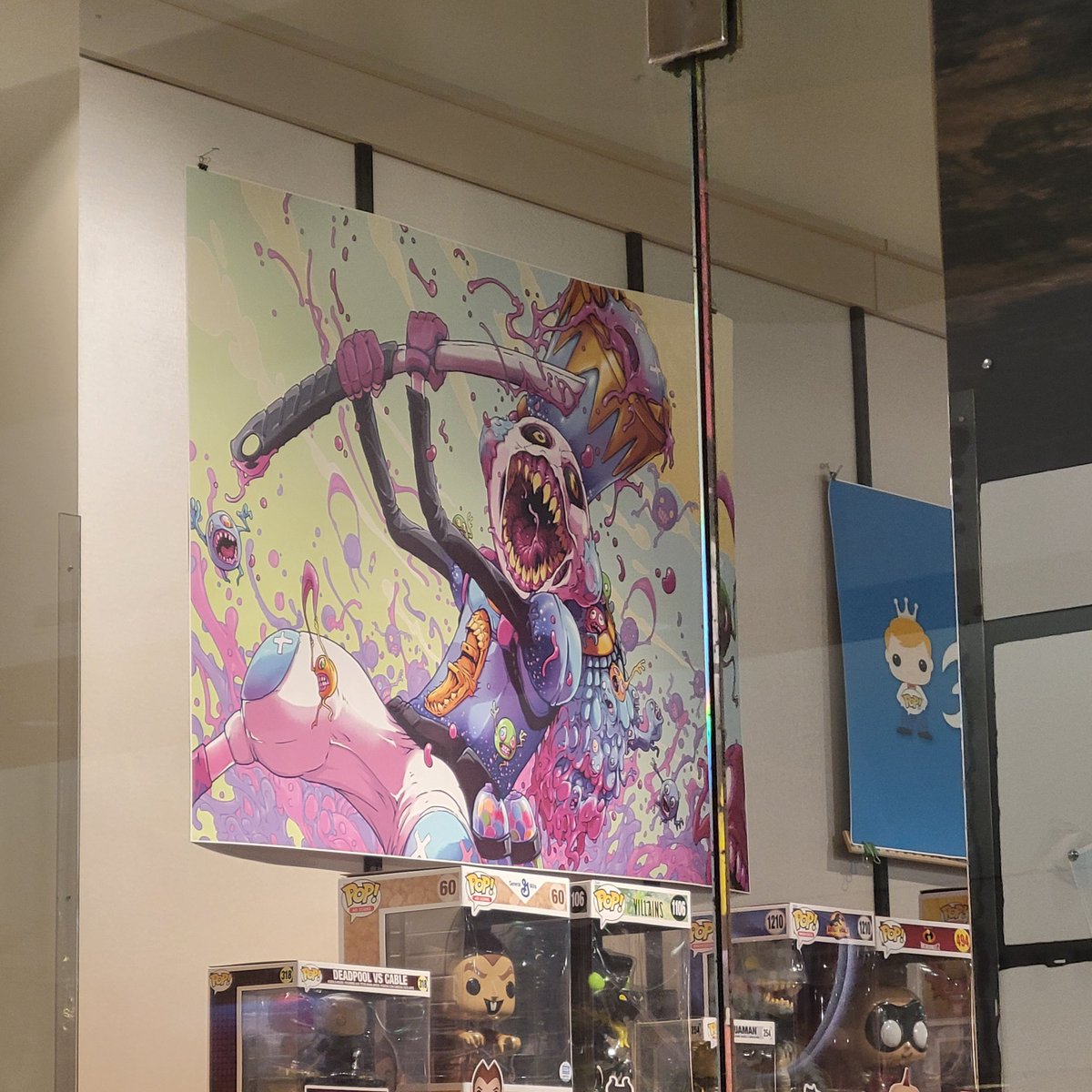 LOOK WHAT THEY HAVE HANGING ON THE WALL AT THE MALL!