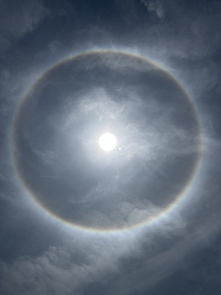 Anyone else see the “Sundog” around the sun today? Reflection off ice crystals cause this phenomenon!