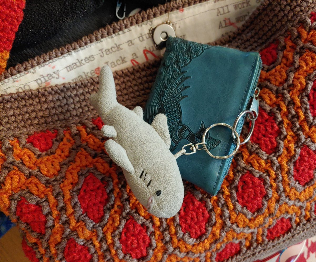 @chramdander @faeriemachine I have a wee plush shark keychain. It's partially bc it makes finding my wallet in my big ole bag easier, partially bc I love him & he's so squishy & cute!