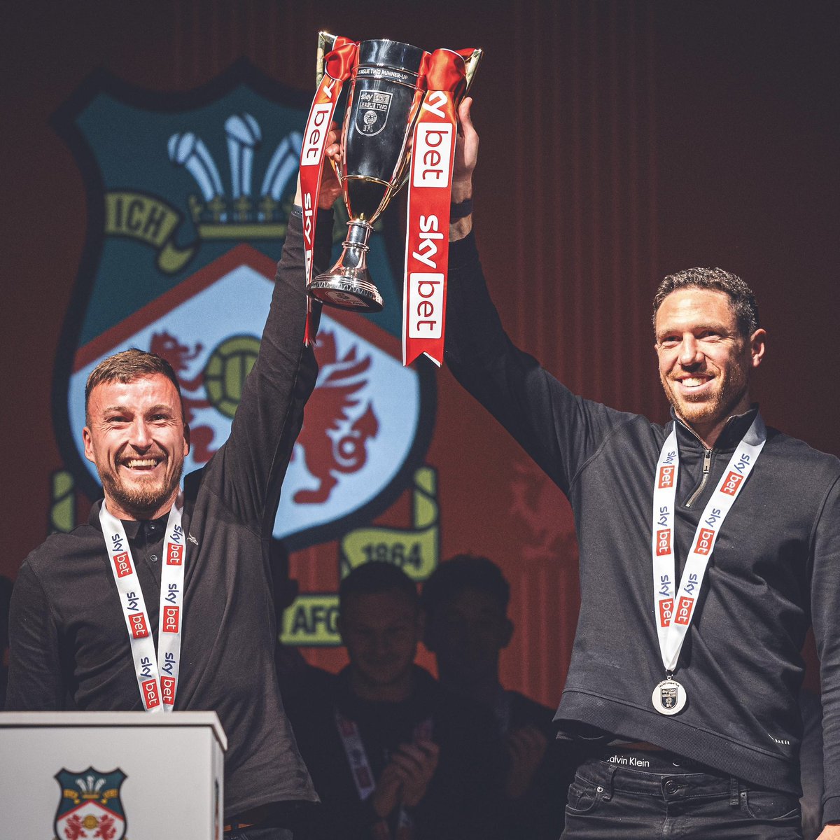 Wrexham AFC 2023/24 Season Recap

Mens
 
League: 2nd 🥈🆙 
FA Cup: 4th Round 
EFL Cup: 2nd Round 
EFL Trophy: Last 16

Womens

League: 3rd 🥉 
FAW Cup: Runners Up
Adran Trophy: Q-F

Youth 

League: 2nd 🥈 
FAW Cup: 1st Round 
FA Youth Cup: 1st Round 

Excellent Season All Round