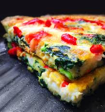 Craving a nutrient powerhouse? 

Try this high-protein veggie frittata! Packed with eggs, spinach, tomatoes & feta (pro tip: use 1 whole egg + 2 whites). A delicious way to build muscle & manage hunger. Just one of many healthy meal ideas to explore! #MuscleBuilding #HighProtein