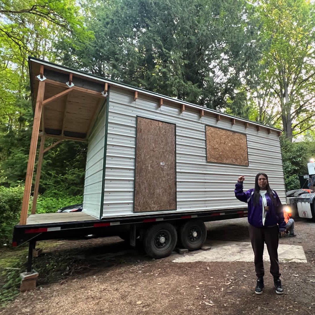 Tiny House Warriors ready to install a kitchen that will soon be a mobile feast house with an art installment of a native double-headed serpent. We will be able to travel to indigenous communities and urban centers to feast and discuss tanker traffic in the Salish Sea.