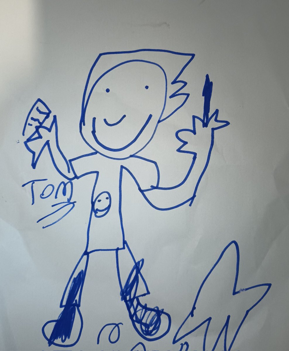 @LizPichon My son loves your books (so do I) and has drawn a picture of Tom Gates. I wanted to show you one of his amazing pictures. I did have to ask him what that was in his left hand..... it is a pen 😂 and he has some paper in the other hand! #tomgates