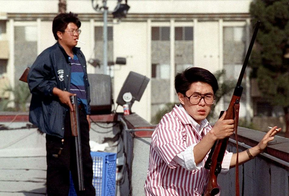 historyinmemes's tweet image. The infamous two Korean men defending a grocery store during the L.A Riots April 30, 1992