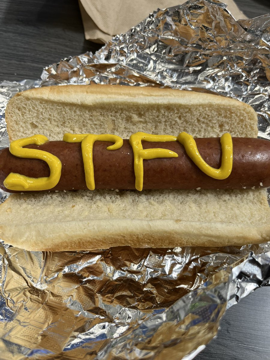 Proper way to eat a Hot Dog.