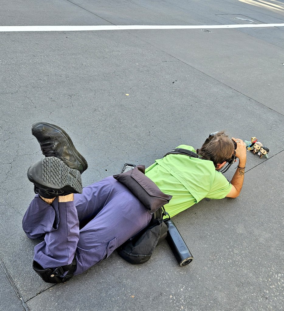 Okay y'all this incredible human being is PhotoPass Joey ( @ joejoethephotographer on Insta), who was so excited to see Loki and family that he flopped right down on Sunset Boulevard to take incredible portraits of them! Literally laid out ON THE GROUND OKAY HE IS ICONIC 👏👏👏