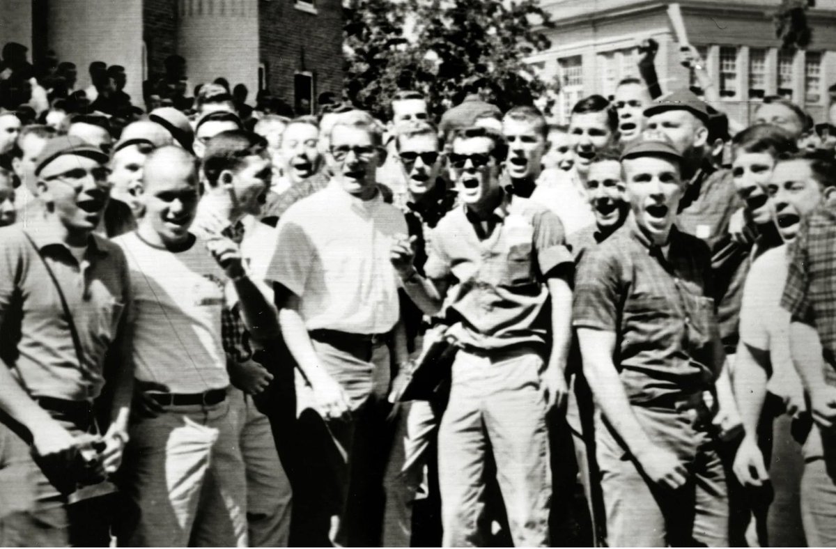 #OleMiss THEN #OleMiss NOW 1962, white students hurled racial epithets at James Meridith as he became the 1st black student enrolled at #OleMiss 2024, white students making monkey noises as a black female student stands with #Gaza in peaceful protest