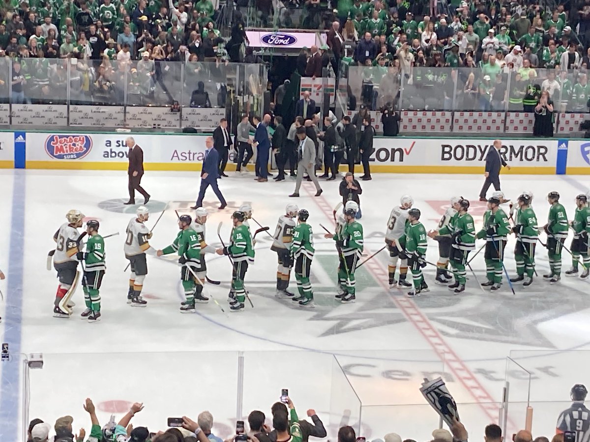 Handshake line at the AAC.
The home team lives to fight another day