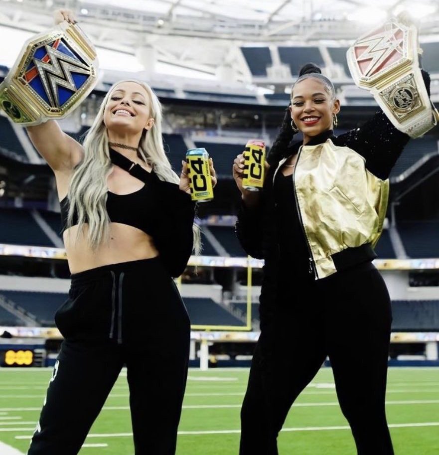 liv morgan & bianca belair as sister champions for raw and smackdown 🫂❤️💙✨