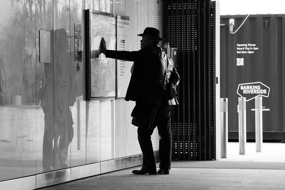 Map Reading, Barking Riverside I was fortunate with this black & white photo of a hat man posing dramatically whilst reading the London tube map. I was using a random lens, so had to swap it quickly. Lucky for me, it took him a while to plan his route #wexmondays #fsprintmonday