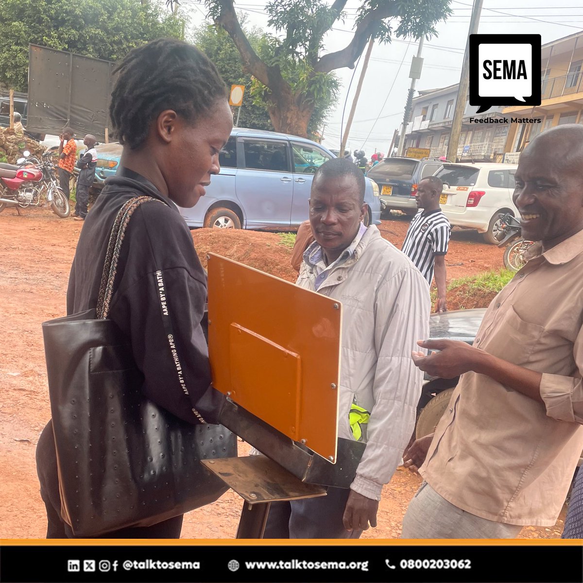 A citizen sensitization session at Old Kampala Police Station on using the USSD code to provide feedback. This initiative aimed to leverage SEMA's diverse feedback tools and empower citizens to actively engage in providing feedback.