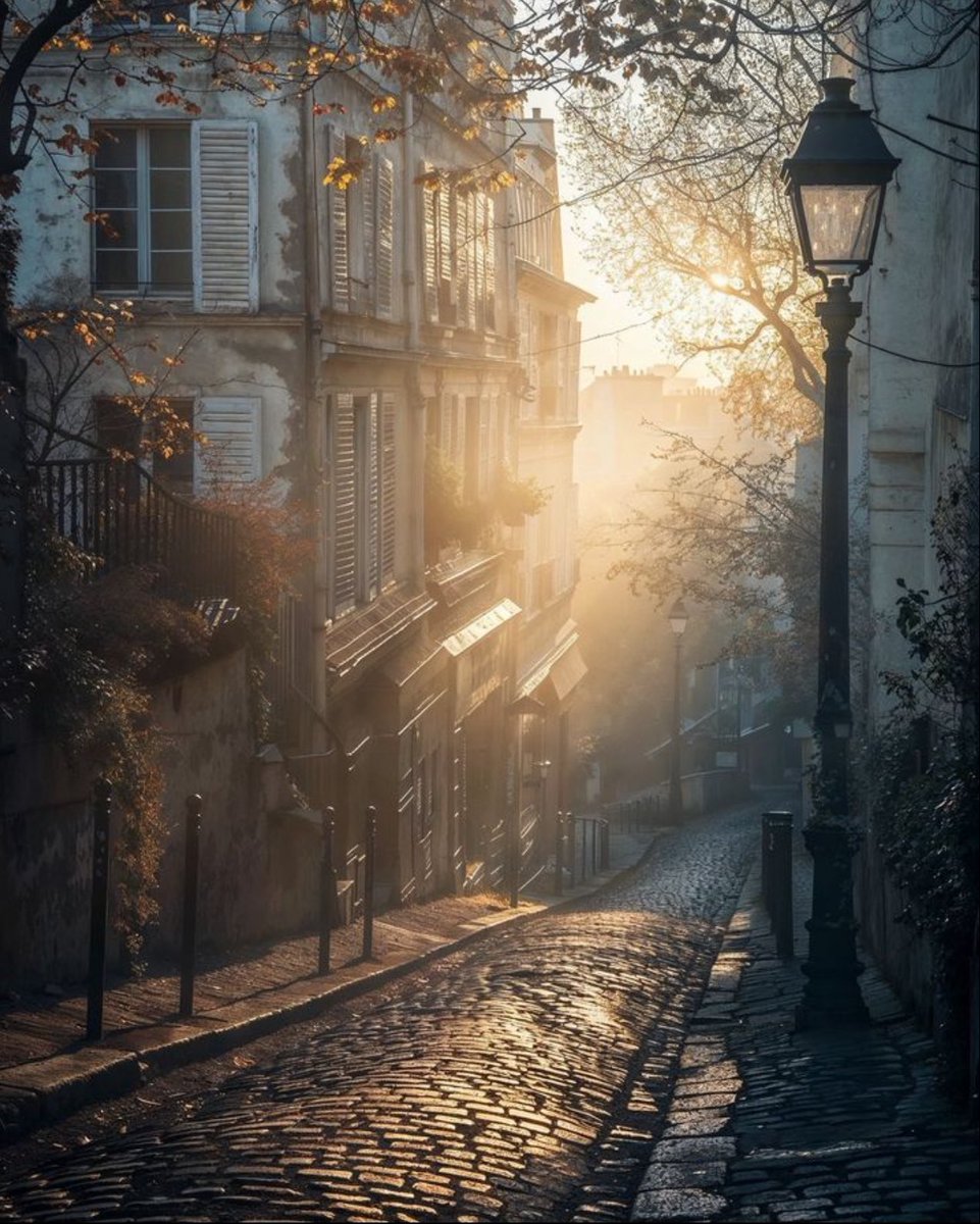 Early morning sunshine and cobblestone streets.