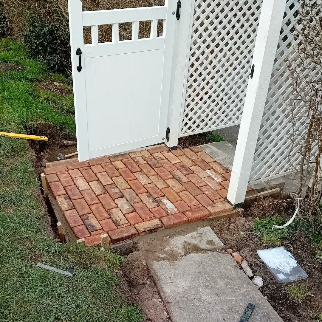 mouse_workshop's tweet image. Continuing with the garden renovation, I put down a brick entrance by the gate. I started by levelling the ground and pouring a concrete base. I need to enclose the bricks with a low sleeper wall and then onto the rest of the path! #gardenrestoration #brickpath