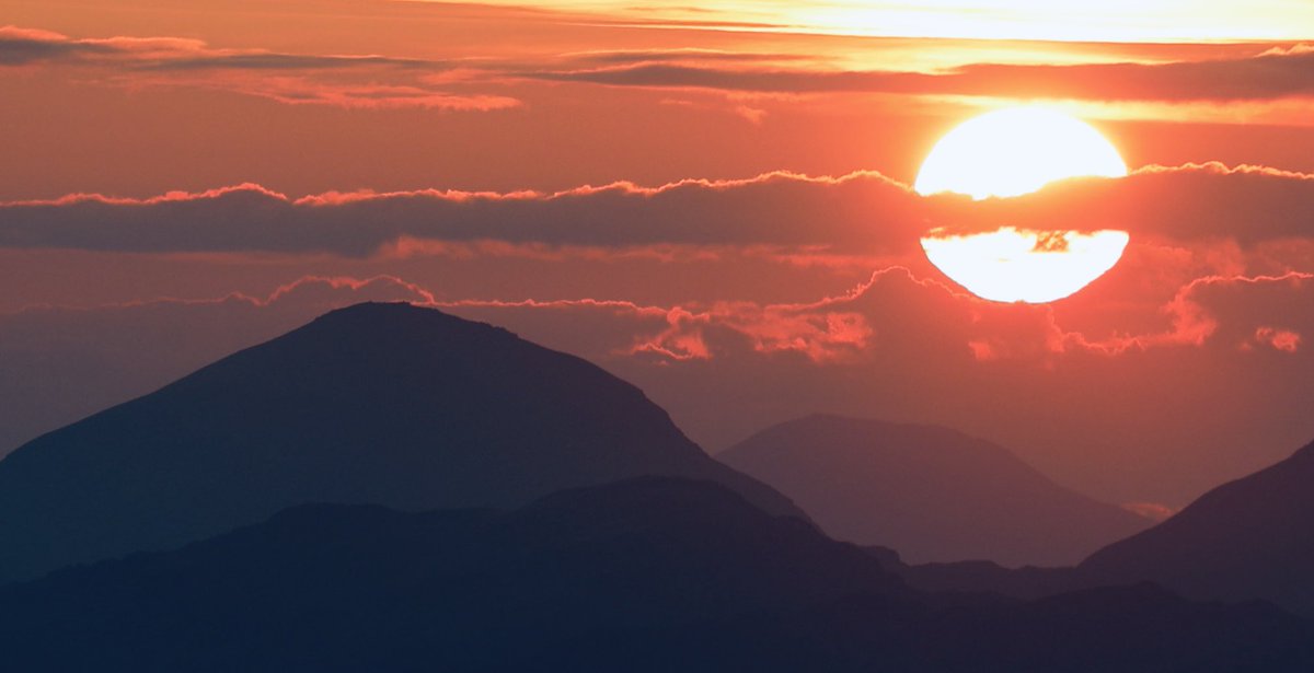 Sunrise from the summit of Beinn Ime (ben EEm), looking towards Ben More. Ben Lawers makes a cameo in the background.