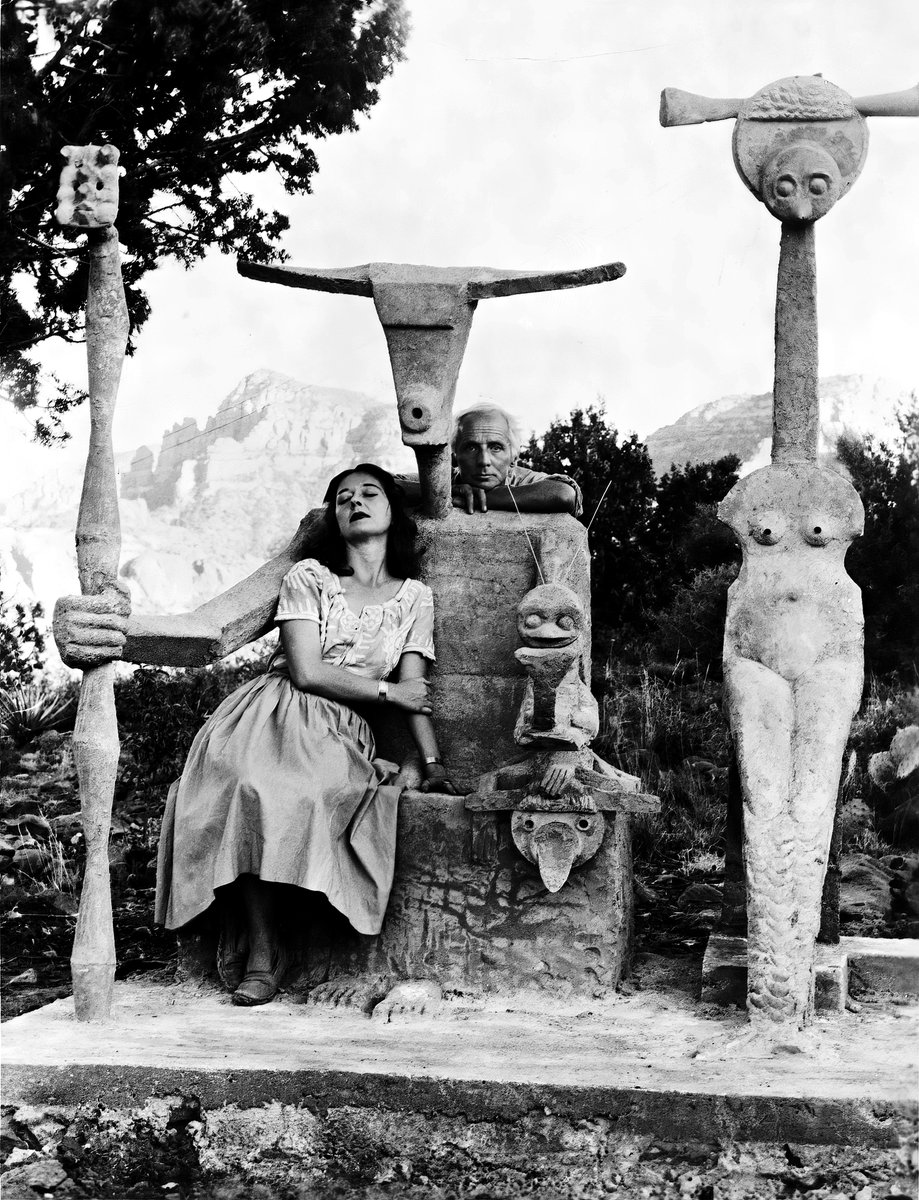 John Kasnetsis - Max Ernst & Dorothea Tanning with his sculpture 'Capricorn' - 1947